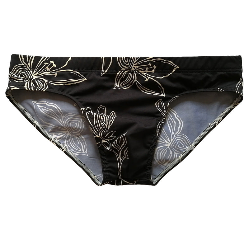 Black Background White Flower Simple Swimming Trunks