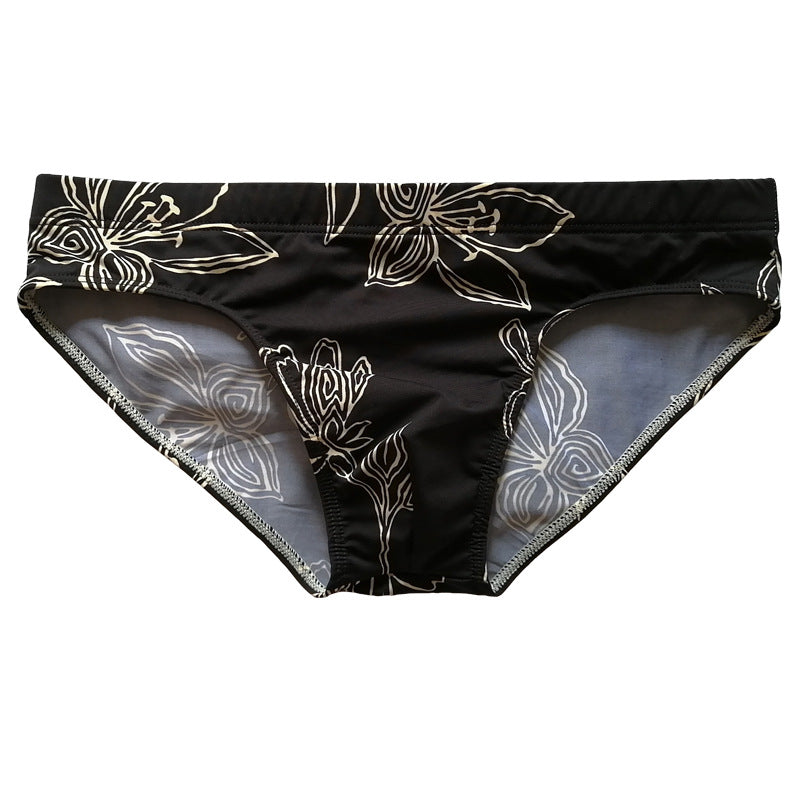 Black Background White Flower Simple Swimming Trunks