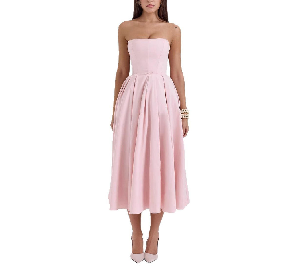 Woman wearing a pink strapless dress on a white background from diamond Sadaf 